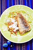 Fried zander with vegetables