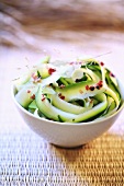 Courgette salad with sesame oil and pink peppercorns