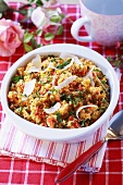 Couscous with peppers, parsley and cheese shavings