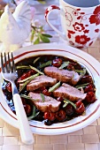 Duck breast with cherries and sage