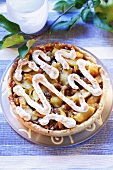 Apple tart with raisins and meringue squiggles