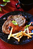 Beefsteak with red pepper sauce and chips