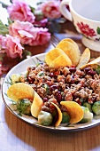 Brussels sprouts with mince, beans and crisps