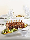 Roast veal with vegetables on festive table