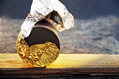 Chocolate wrapped in gold foil