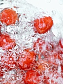 Cranberries in bubbling water