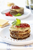 Tower of bread, cheese & caraway seeds with toasted cheese topping