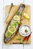 Trout stuffed with lentils, with chilli yoghurt