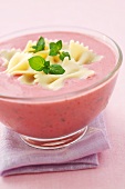 Cold strawberry yoghurt soup with farfalle and mint