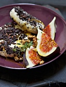 Cheese with dried vine leaves, honey, walnuts, figs