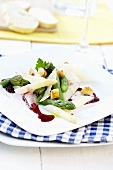 Asparagus salad with blackberry dressing and croutons