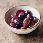 Black olives in a small bowl