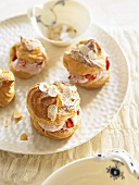 Strawberry profiteroles with caramel icing