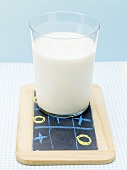 Glass of milk on slate board