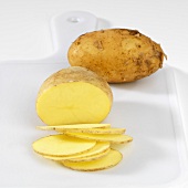 Potatoes, one whole, one partly sliced