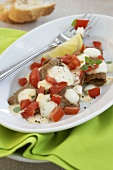 Veal escalopes with mozzarella and tomatoes