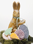 Baked Easter Bunny and biscuits on moss