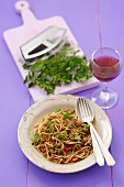 Spaghetti and mince sauce with olives and herbs