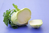 Kohlrabi with leaves, a piece cut off