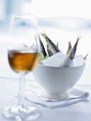 Deep-fried anchovies and glass of wine