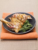 Goose leg with pine nuts and herbs