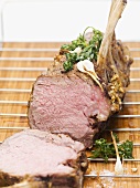 Roast rack of lamb with parsley and garlic on rack