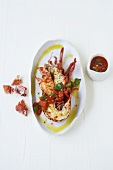 Grilled lobster with tomato and basil sauce
