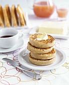 Toasted crumpets (English yeast cakes) for breakfast