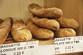 Baguettes with prices in a baker's shop