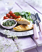 Grilled chicken breast with vegetables and caper tapenade