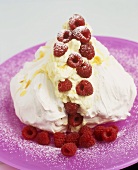 Meringue with whipped cream and raspberries