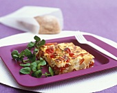 Frittata with potatoes, peppers and tomatoes