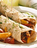 Wheat tortilla with chicken and vegetable filling