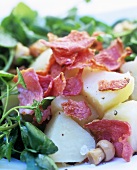 Warm potato salad with bacon and watercress