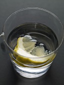 A glass of mineral water with lemon