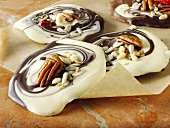 Marbled chocolate rounds with pecans and seeds