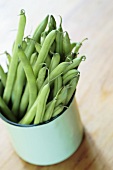 Green beans (French beans) in enamel mug