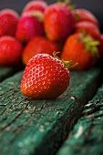 Fresh strawberries on wooden background