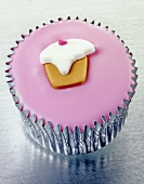 Cupcake with pink icing