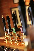 Row of beer pumps in an English pub