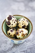 Quails' eggs in a small Chinese bowl