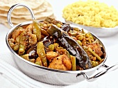 Undhiyu (Indian vegetable dish) with rice and flatbread
