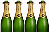 Vier geöffnete Champagnerflaschen