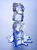 Four ice cubes in a pile