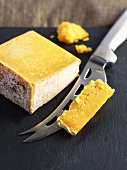 Double Gloucester with cheese knife (Semi-hard cheese, England)