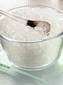 Coarse lemon salt in a glass bowl