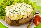A baked potato with quark and chives