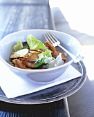 Salad leaves with chicken breast, apple and Parmesan