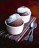 Chocolate rum soufflés in two soufflé dishes