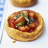Cherry tomato puff pastry tarts with basil